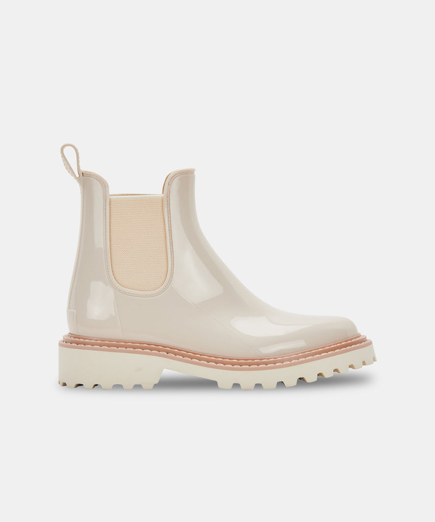 STORMY RAINBOOTS IVORY PATENT STELLA– Dolce Vita 6606055571522